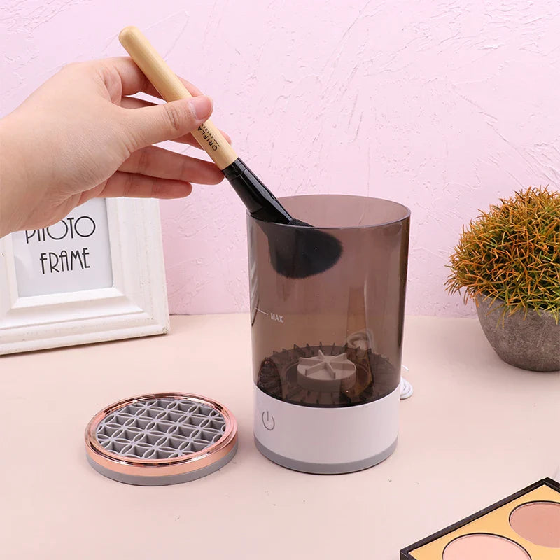 "Keep your makeup brushes clean and dry in no time with this Electric Makeup Brush Cleaner! 💄✨ #makeup #beauty"